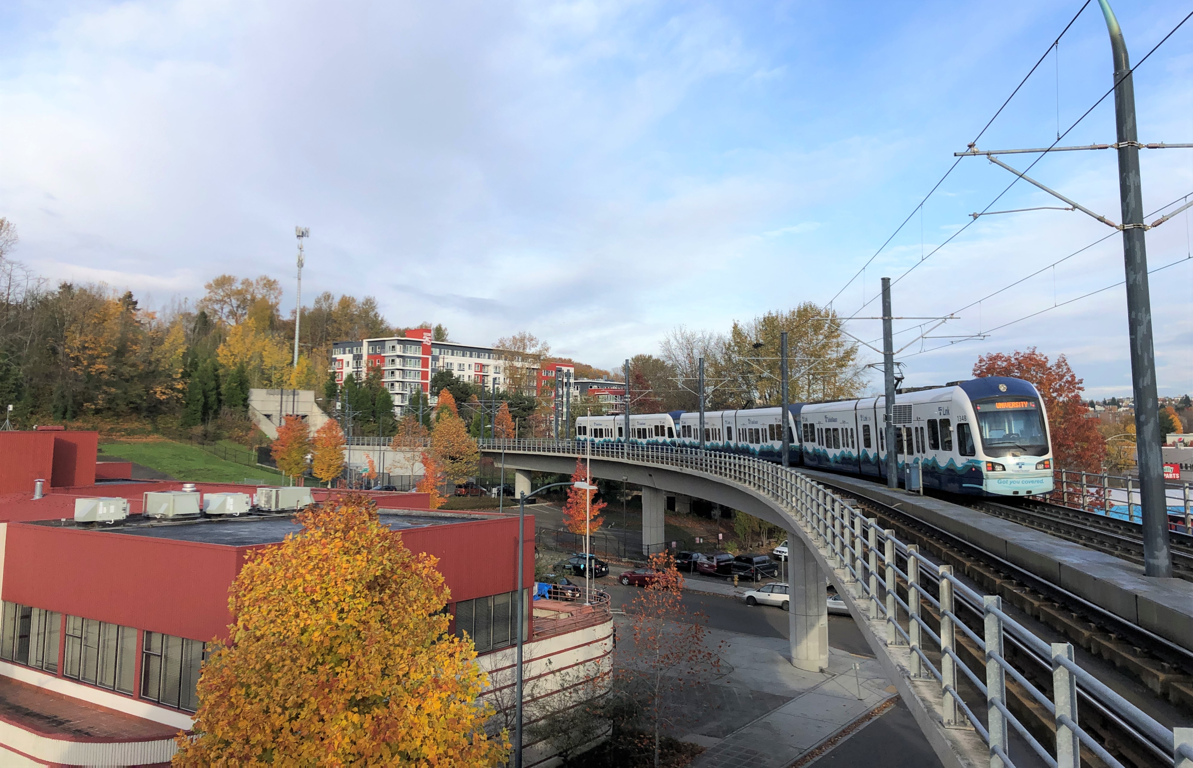 Light rail train traveling over Mt Baker neighborhood
