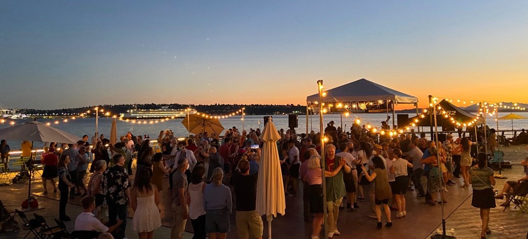 Dancing Til Dusk Event on the pier at sunset hour