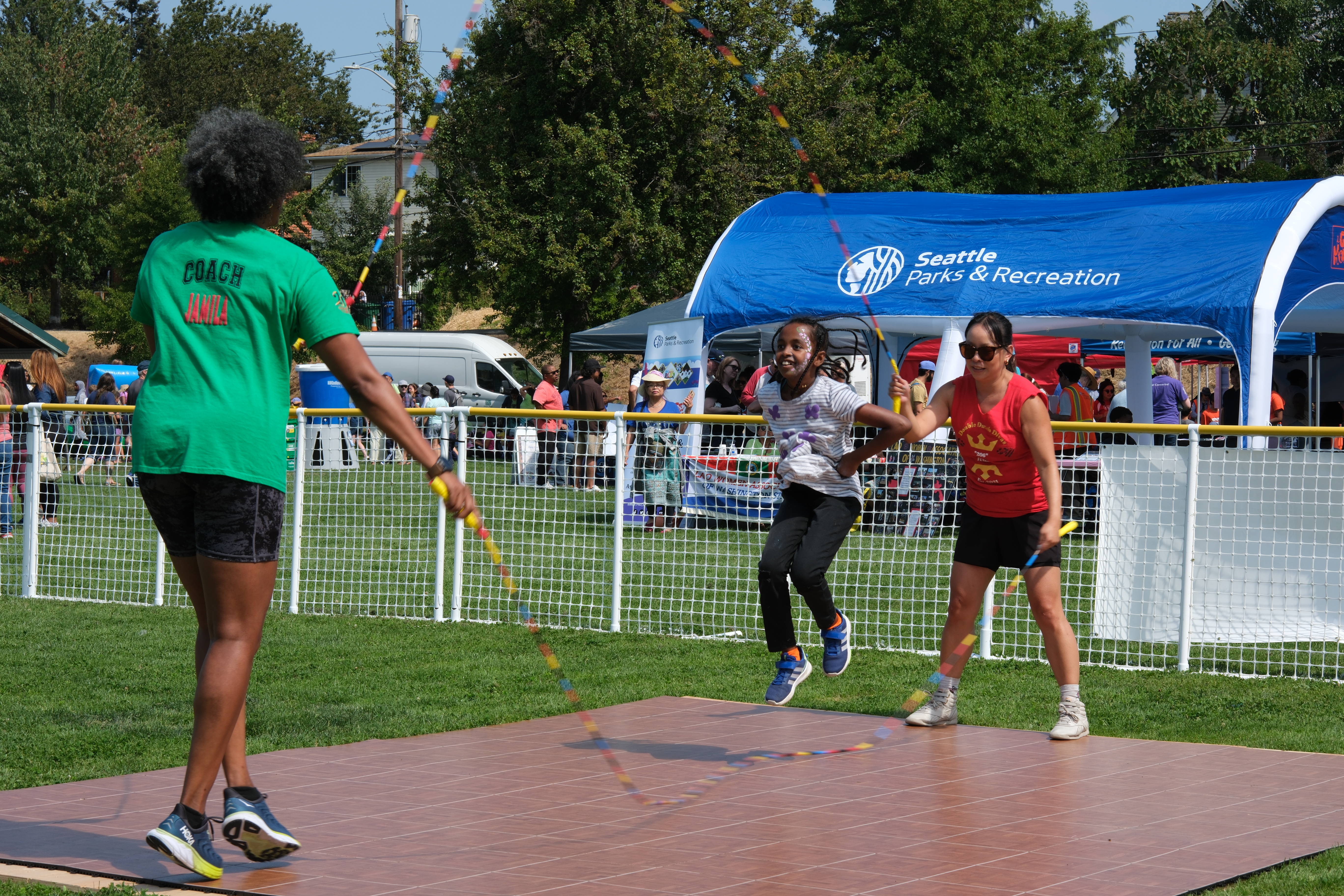 3 people practice Double Dutch at Big Day of Play