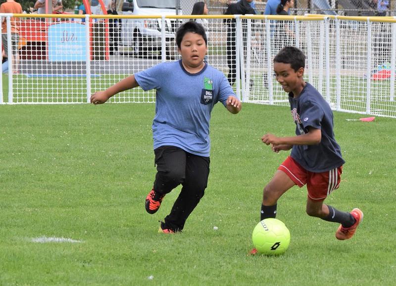 Children playing soccer