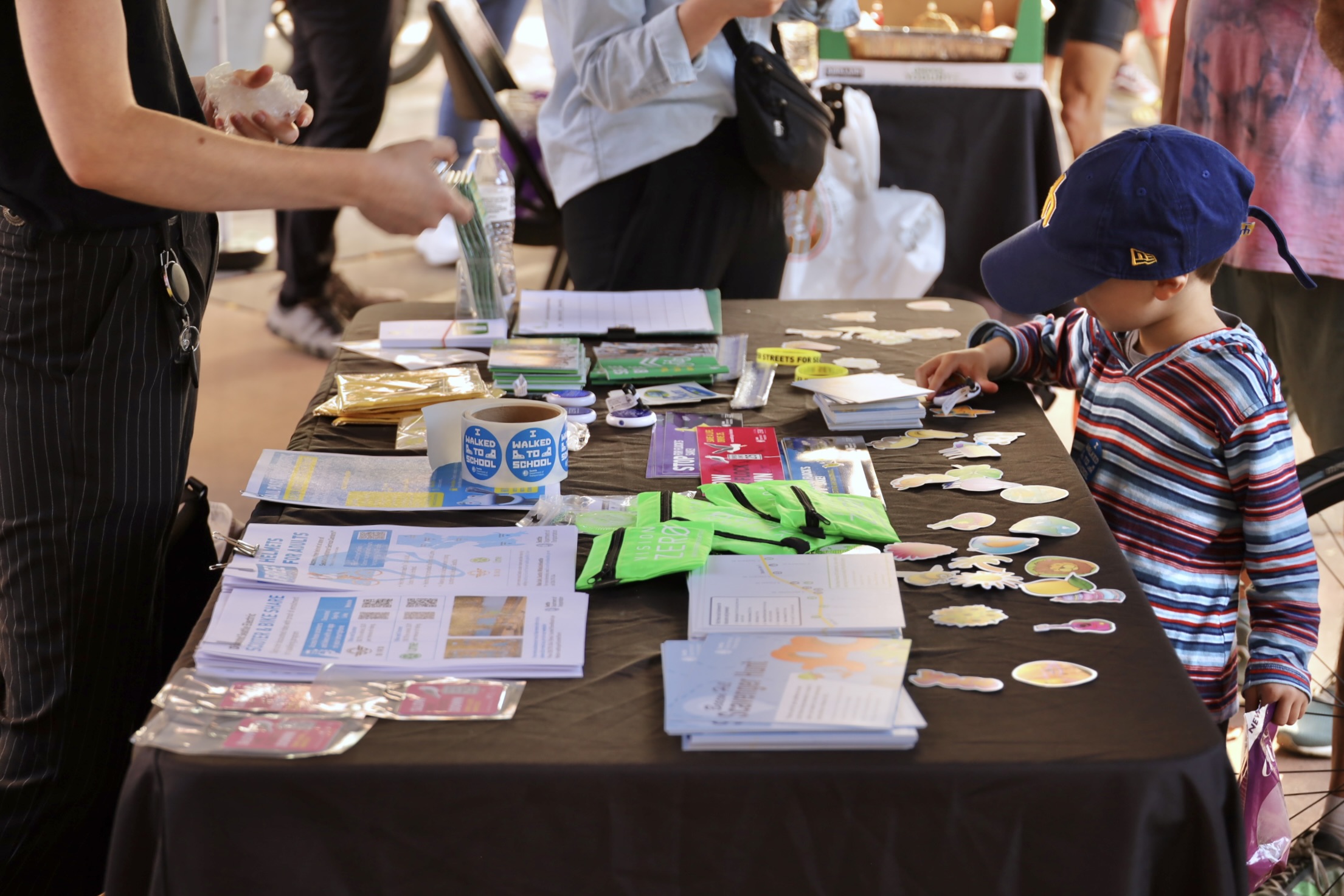 The station for Hot Bike Summer Passports,  Beacon Hill Scavenger hunt cards, SDOT giveaways, and lots of stickers!