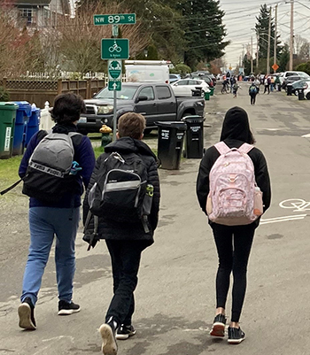 Middle school students walking to school.