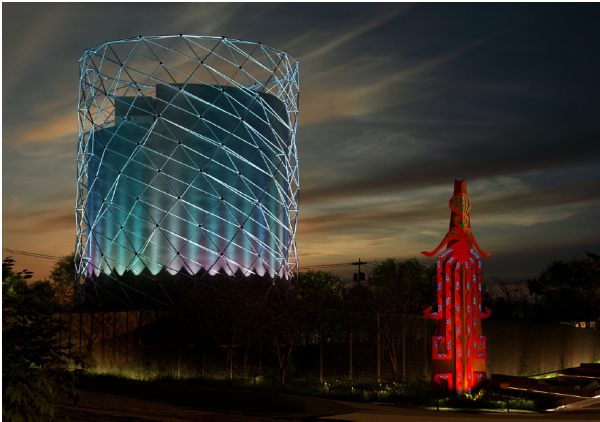 Pump station and artwork lit up at night.