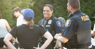 police officers smiling on a sunny day
