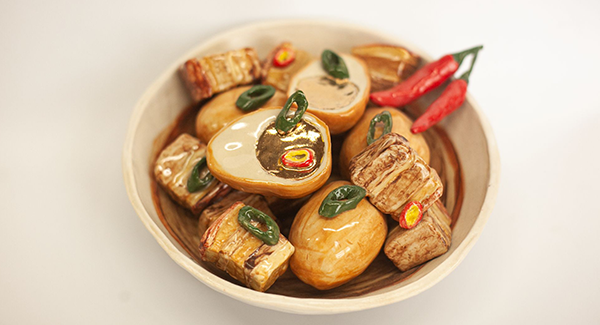 A realistic clay sculpture of Vietnamese food