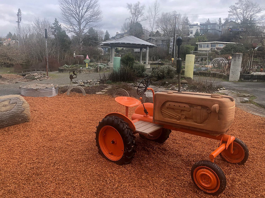 Bradner Gardens Park 2021 renovated play area and tractor in foreground