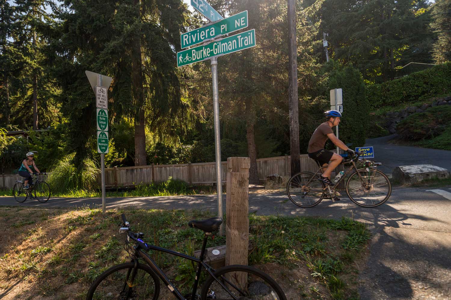 Burke-Gilman Trail bike riders at intersection - photo by TIA International Photography