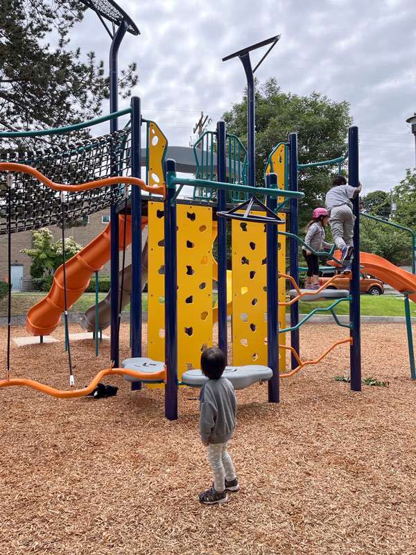 Spruce Street Mini Park Group of children playing in play area