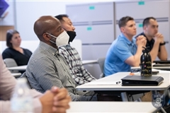 Pre-BLEA recruits sitting at a table