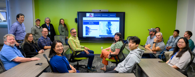Seattle IT GIS team meeting in a conference room
