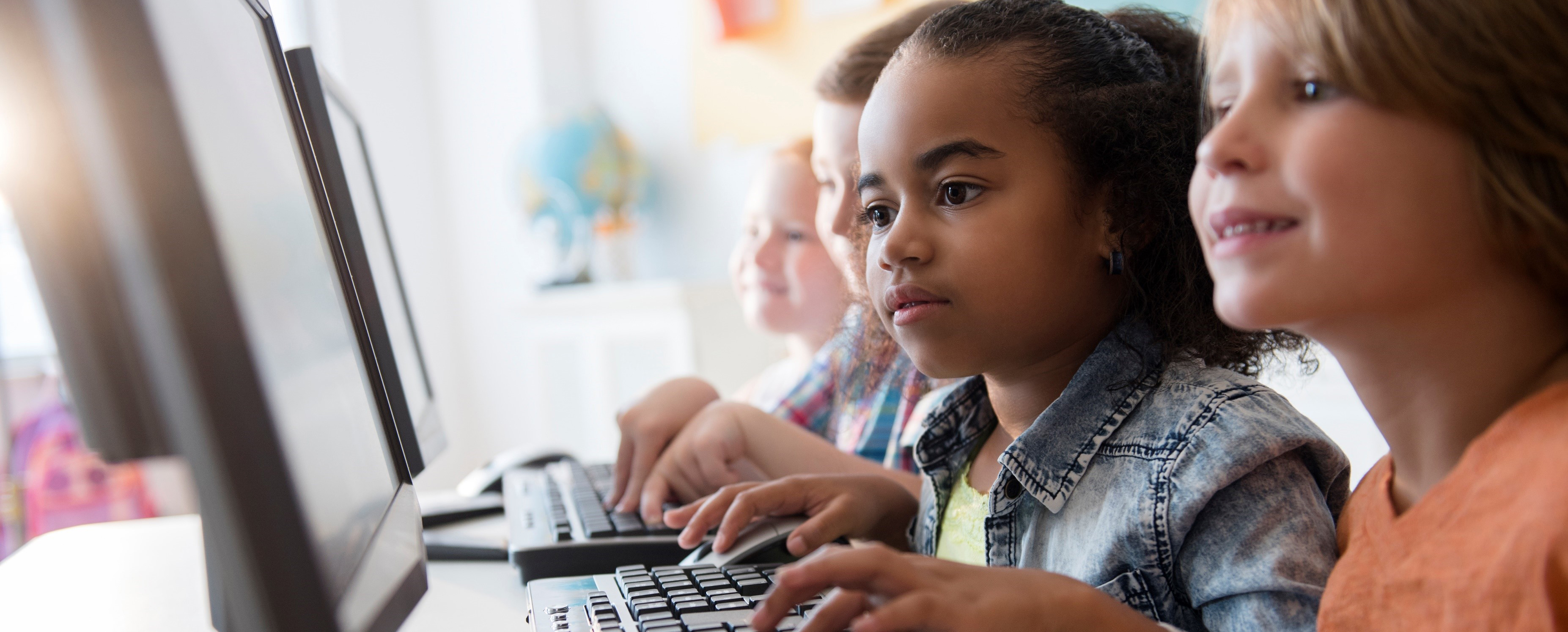 Children using computers. 