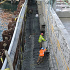 Installing textured face panels, habitat benches, and marine mattresses